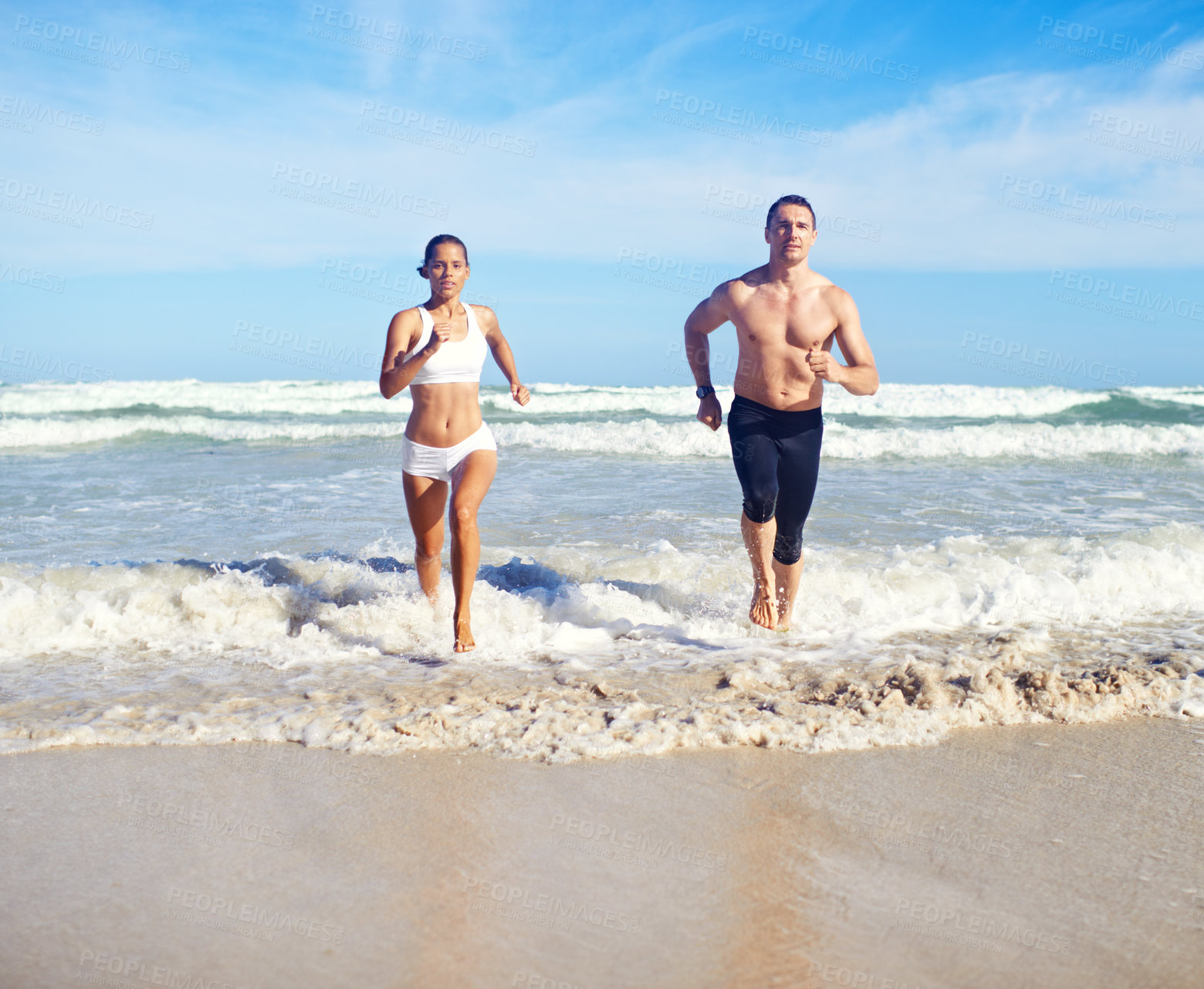 Buy stock photo Running, beach and couple with fitness, waves and weekend break with cardio and training for health. Runners, seaside and man with woman and support with practice and activity for wellness and hobby