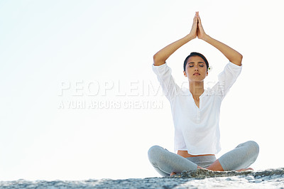 Buy stock photo Woman, yoga and meditation at beach with space, peace and zen breathing with namaste hands over head. Girl, Indian person and outdoor with mockup, nature or holiday on sand for mindfulness in Mumbai