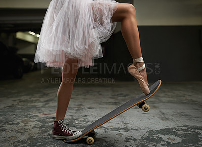 Buy stock photo A cropped image of a woman on a skateboard wearing one sneakers and a ballet slipper