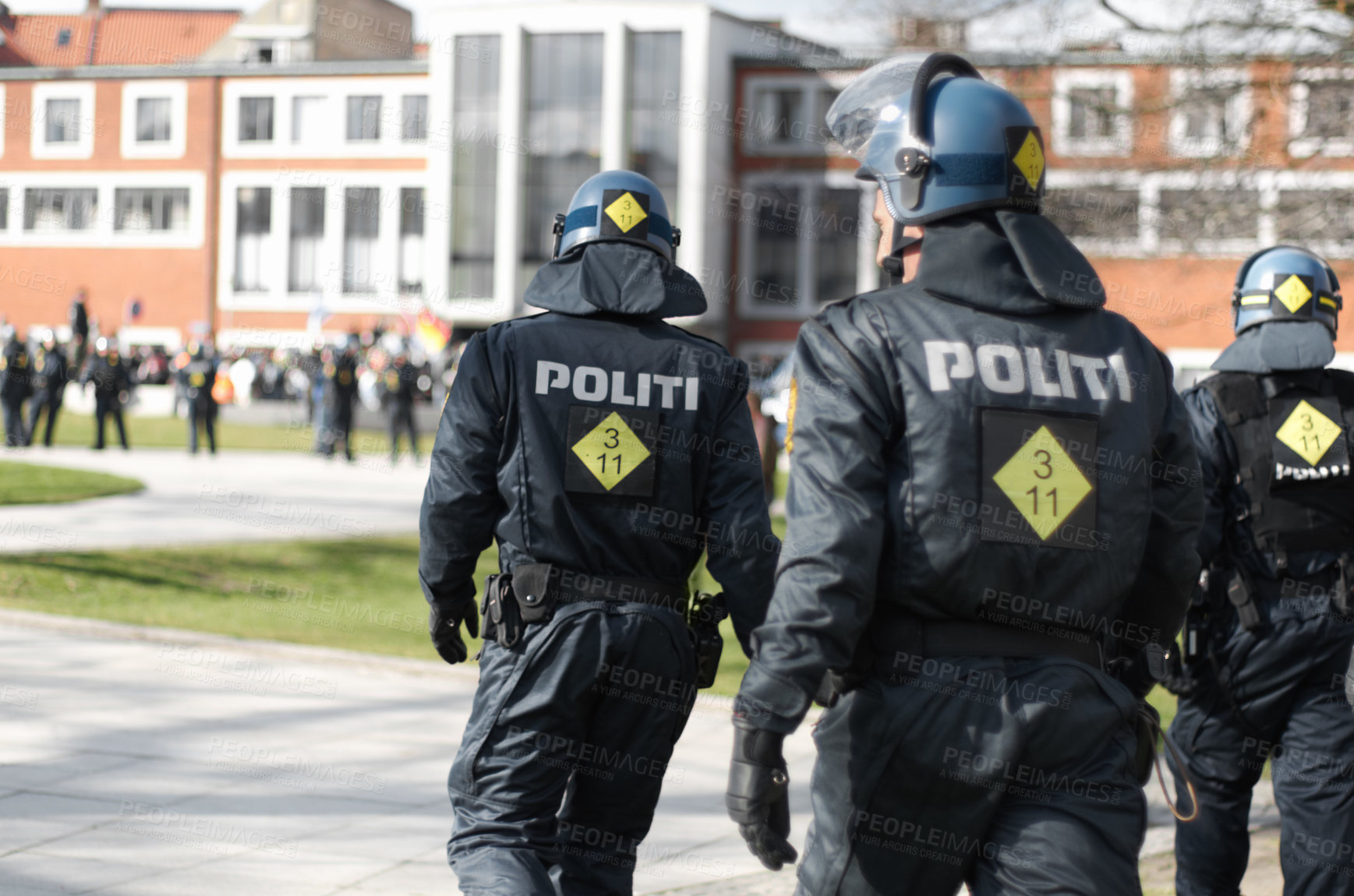 Buy stock photo Law enforcement, riot and protest with police officer in city for safety, protection or security. Brave, uniform and government with group of policeman in street for rally, human rights or activist