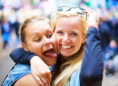 Buy stock photo Lesbian couple, smile and portrait of women at music festival outdoor, love and fun together on valentines day. Embrace, lgbtq and face of happy girls at party for celebration, funny or tongue out