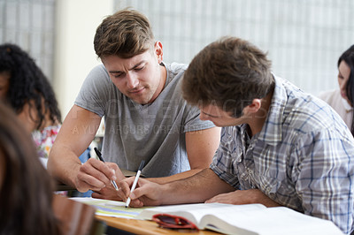 Buy stock photo Shot of young college student studying