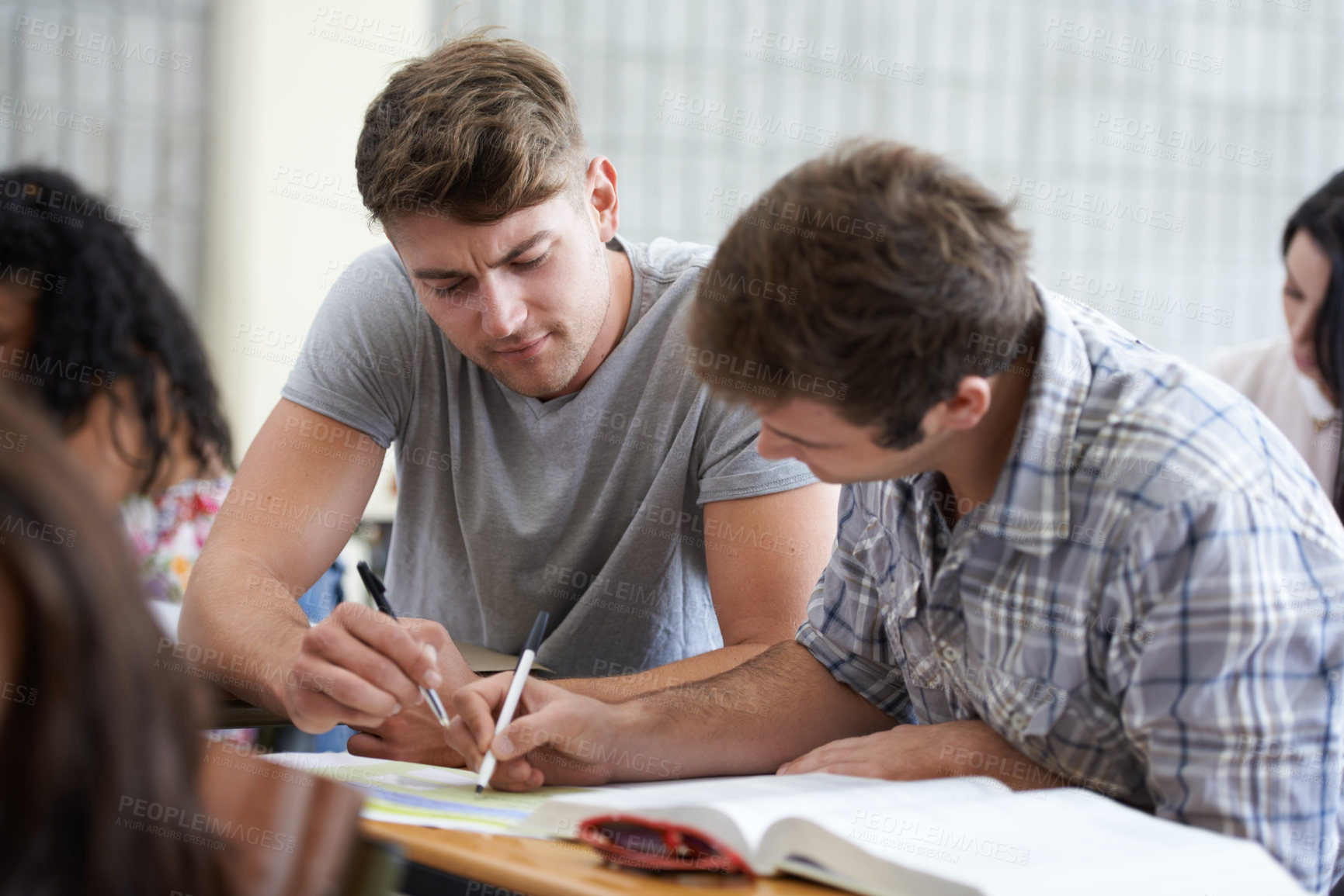 Buy stock photo Shot of young college student studying