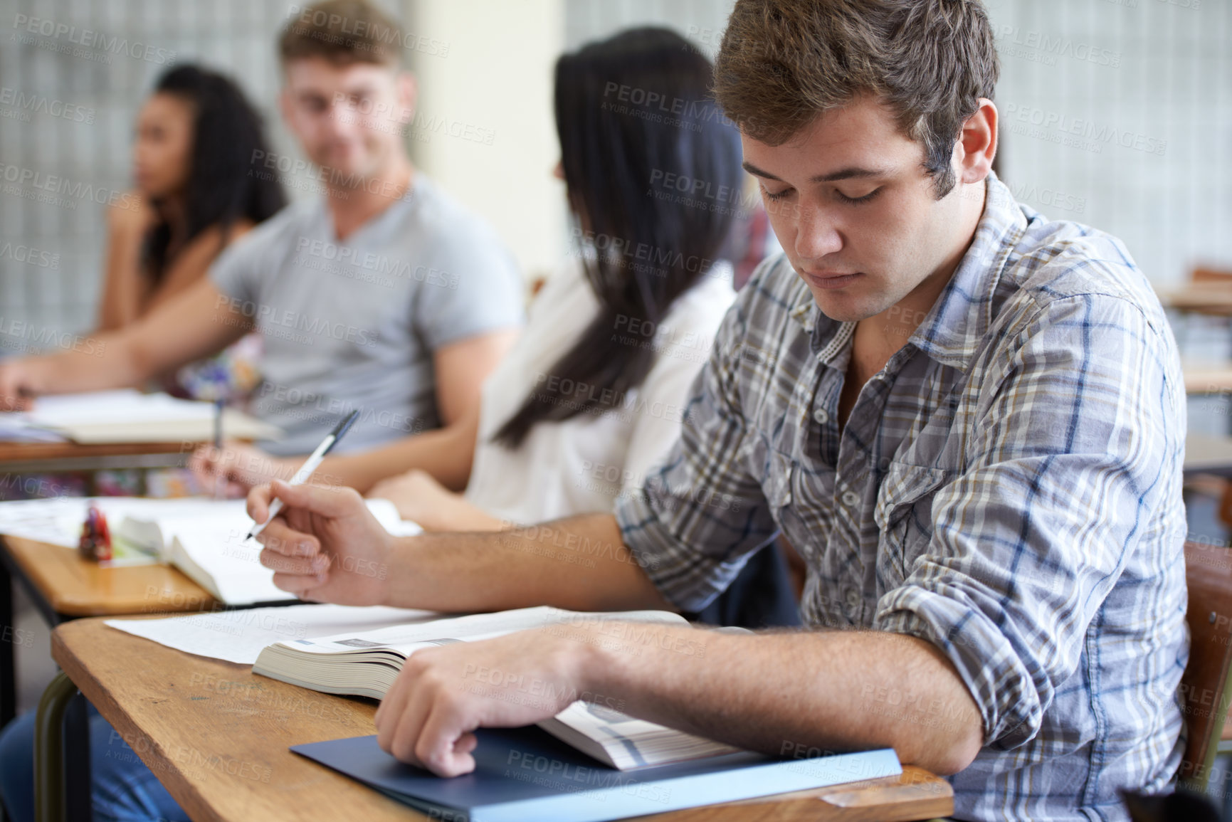 Buy stock photo University, book and man in class reading with ambition for development in learning, opportunity and future. Education, knowledge and growth for college student in lecture, studying for exam or test.