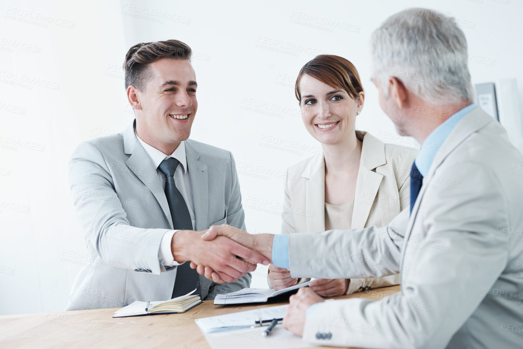 Buy stock photo Shaking hands, happy business people or smile for partnership agreement or b2b deal in meeting. Handshake, start or excited corporate lawyers in collaboration for teamwork with contract or paperwork