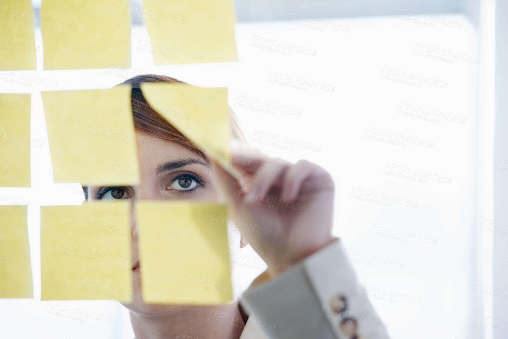 Buy stock photo Employee, sticky notes and glass wall for logistics, thinking and vision for planning and ideas. Businesswoman, brainstorming and mockup for meeting, goals and teamwork for project management