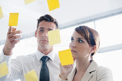 Buy stock photo Business people, glass wall and sticky note with conversation, collaboration and planning. Brainstorming for a project, cooperation and schedule with staff, meeting and agency with startup and ideas