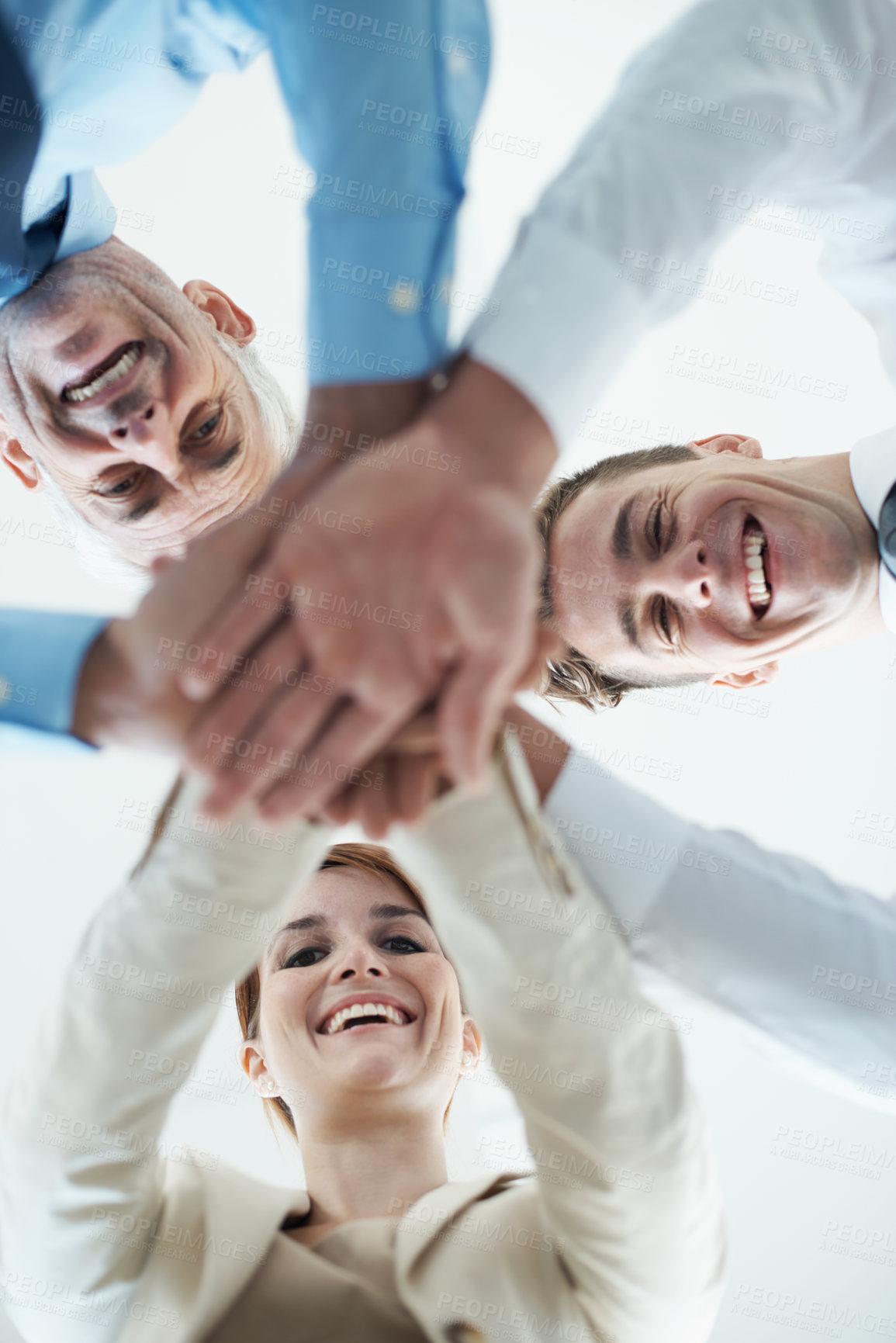 Buy stock photo Portrait of a group of business people standing in a huddle