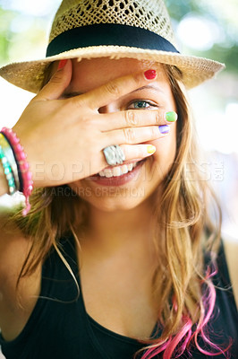 Buy stock photo A young woman wearing multi-coloured nail polish