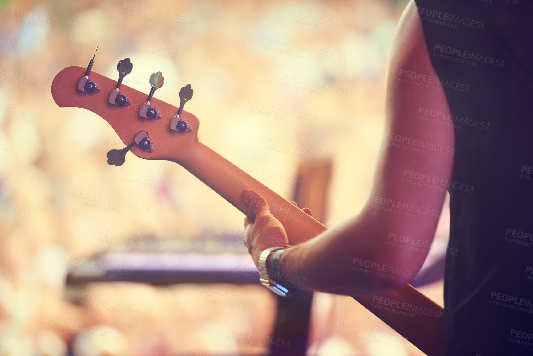 Buy stock photo Man, festival and guitar at stage for concert, performance and back view in Amsterdam. Closeup of male musician, standing and playing instrument at live event for crowd, audience and enjoyment