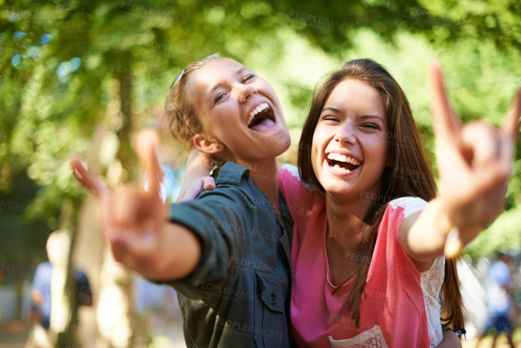 Buy stock photo Friends, portrait and women with rock hands at music festival outdoor, bonding and fun together at summer event.  Smile, horn sign and happy girls at party for celebration, excited or laugh in nature