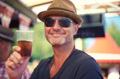 Buy stock photo Mature, happy man and portrait with beer outdoor at festival in park, woods or party in nature. Person, drinking and toast with plastic cup with alcohol for celebration at event in forest or summer