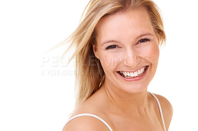 Buy stock photo An attractive young woman smiling at the camera - isolated