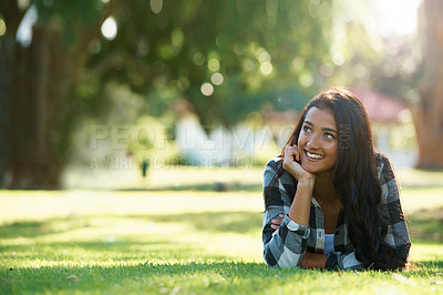 Buy stock photo Happy, park or woman thinking on grass to relax for rest in garden, nature or field with peace. Ideas, glasses or female person on break with smile for summer vacation, holiday or wellness on lawn