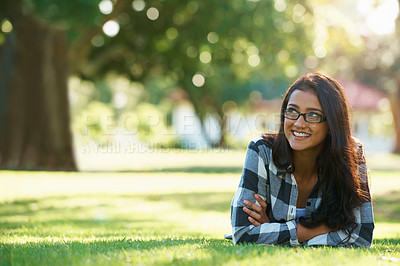 Buy stock photo Thinking, park or happy woman on grass to relax for rest in garden, nature or field with peace. Ideas, glasses or female person on break with smile for summer vacation, holiday or wellness on lawn