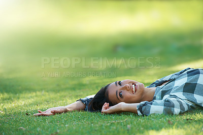 Buy stock photo Space, thinking or woman on grass in park to relax for rest in garden, nature or field alone for peace. Mockup, ideas or happy female person on break with smile on outdoor vacation or holiday on lawn