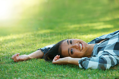 Buy stock photo Space, portrait or happy woman on lawn to relax for rest in park, nature or field for peace in USA. Flare, travel or female person on break with smile on outdoor summer vacation or holiday on grass