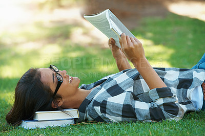 Buy stock photo Relax, grass or happy woman in park reading book for learning knowledge, information or education. Smile, textbook or student in nature for studying history, story or novel on college campus lawn