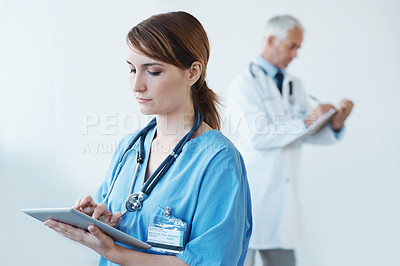 Buy stock photo Tablet, research and woman nurse in hospital for medical diagnosis, surgery or treatment. Digital technology, information and female healthcare worker reading on internet in medicare clinic.