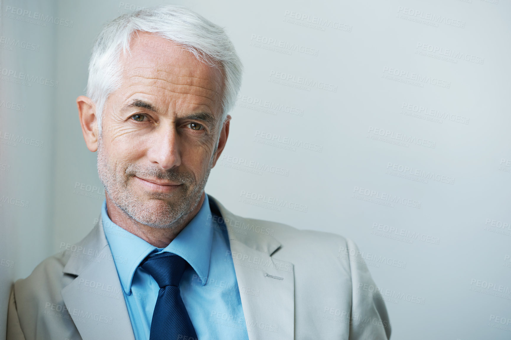 Buy stock photo Portrait of a confident-looking mature businessman