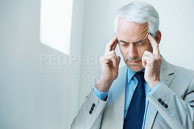 Buy stock photo CEO, headache and business man with pain, tired or burnout at company office. Migraine, senior manager and massage temples for stress, sick or frustrated at mistake with anxiety for financial crisis