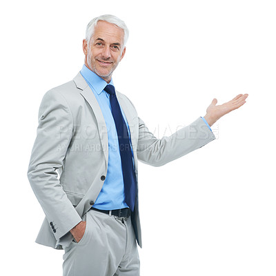 Buy stock photo Studio portrait of a handsome businessman gesturing to copyspace isolated on white