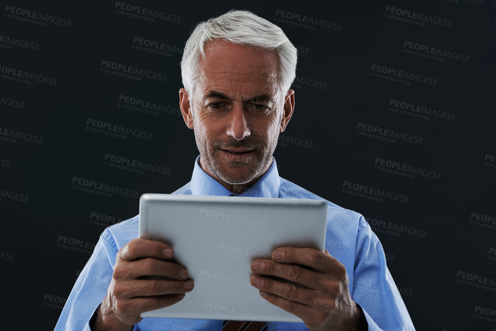 Buy stock photo CEO, tablet and business man research information in studio isolated on a black background. Digital technology, professional or senior consultant on internet, networking or reading email notification