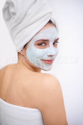 Buy stock photo A young woman wearing a facemask