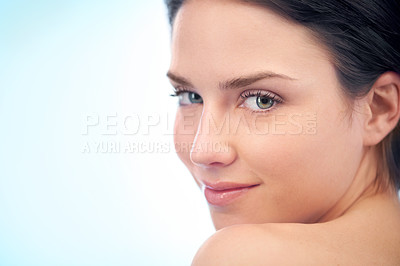 Buy stock photo Wellness, skincare and portrait of woman in studio with health, cosmetic and facial routine. Beauty, glow and young female person with face dermatology treatment by blue background with mockup space.