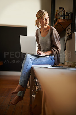 Buy stock photo Woman, freelancer and laptop for writing, remote work and internet connection in kitchen for info. Female person, editor and website for research or online news, blog and typing an article on tech