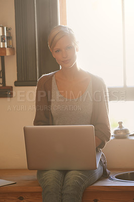 Buy stock photo Woman, freelancer and laptop in portrait, writing and internet connection in kitchen for info. Female person, editor and website for research or online news, blogging and typing an article on tech