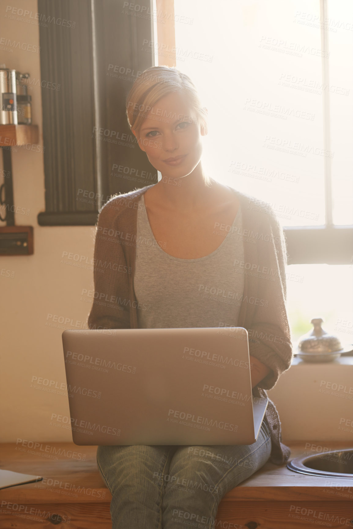 Buy stock photo Woman, freelancer and laptop in portrait, writing and internet connection in kitchen for info. Female person, editor and website for research or online news, blogging and typing an article on tech