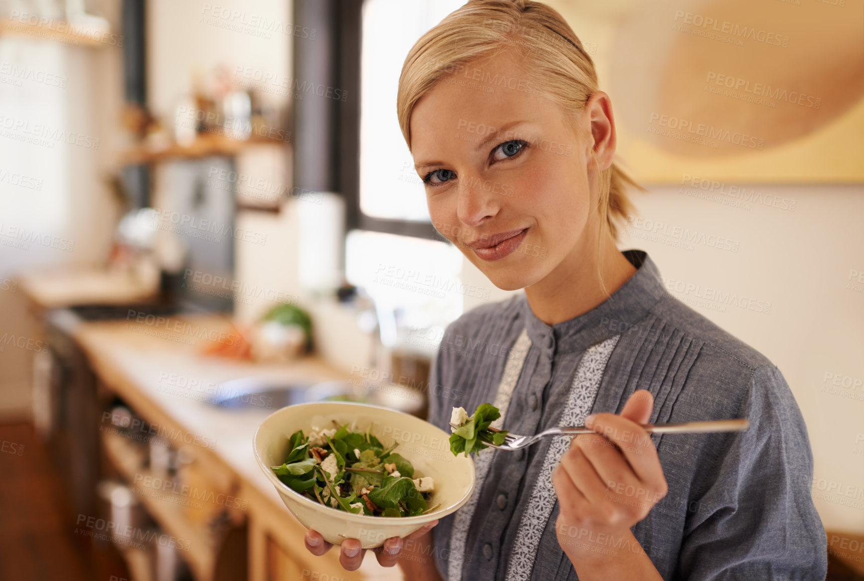 Buy stock photo Woman, portrait and salad eating in kitchen or health nutrition for wellbeing, ingredients or fibre. Female person, face and bowl or vegetable meal in apartment for diet leafy greens, food or Canada