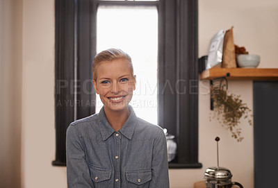 Buy stock photo Happy, portrait and woman relax in a kitchen on vacation, holiday or day off with morning coffee. Smile, face or female person chilling in a house with feel good mood, confidence or positive attitude