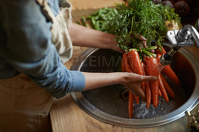 Buy stock photo Hands, carrots and washing in sink as vegetable nutrition for wellness ingredient for healthy, salad or organic. Chef, water and clean in kitchen for meal preparation with recipe, vitamins or fibre