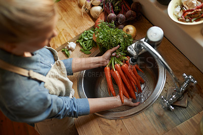 Buy stock photo Hands, carrots and washing in sink for healthy vegetable for wellness ingredient or organic, salad or hygiene. Chef, water and clean in kitchen for meal preparation with recipe, vitamins or above