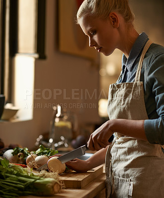 Buy stock photo Cooking, woman and vegetable chop with knife in a home with diet, nutrition and healthy food. Kitchen, green and happy from organic and vegan lunch with mushroom and wood board with wellness