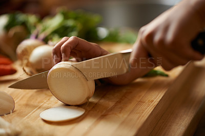 Buy stock photo Person, hands and vegetable slice for salad with knife, wellness and health in a home with nutrition. Vegan, wood board and cooking with diet food in a kitchen with healthy dinner or lunch recipe