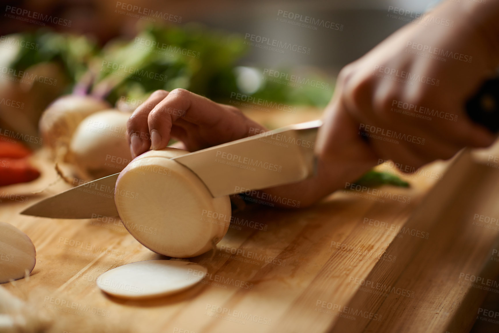 Buy stock photo Person, hands and vegetable slice for salad with knife, wellness and health in a home with nutrition. Vegan, wood board and cooking with diet food in a kitchen with healthy dinner or lunch recipe