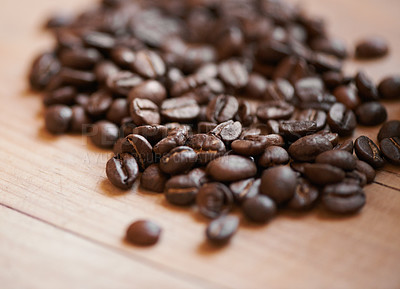 Buy stock photo Coffee beans, counter and espresso drink or caffeine preparation for beverage, cafe or cappuccino. Roasted, blend and ingredient for latte or restaurant barista for kitchen scent, breakfast or grind
