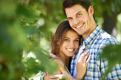 Buy stock photo Portrait, happy young couple and hug in nature in the park and bonding outdoors in Italy. Love, relationship and travel with romantic partners, getaway date for holiday summer laughing with affection
