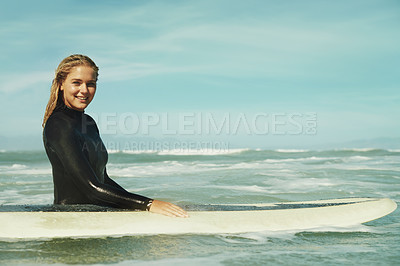 Buy stock photo Portrait, smile and woman with surfboard in ocean for sports, vacation or holiday in summer. Sky, sea and waves with happy young surfer person in wetsuit for travel, fitness or exercise in nature