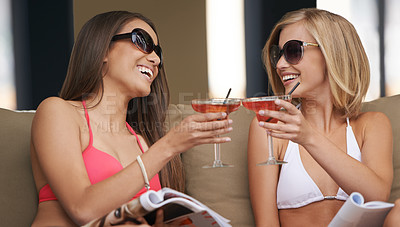 Buy stock photo Friends, women and toasting with alcohol at hotel, celebration and drinking wine on tropical vacation. People, happy and cheers with cocktail on summer holiday, weekend trip and travel to resort