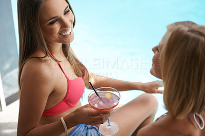 Buy stock photo Swimming pool, friends and women with cocktails, vacation and conversation with a smile and bonding together. Girls, outdoor and water with people or alcohol drinks with discussion and relax with joy