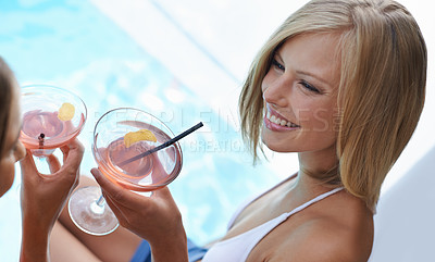 Buy stock photo Swimming pool, friends and women with cocktails, relaxing and conversation with a smile and excited. Girls, outdoor and water with people or alcohol drinks with discussion and joy with celebration