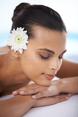 Buy stock photo Woman, massage and spa treatment for relaxing, wellness and beauty therapy for body care. Organic skincare, calm and serene or female person on bed, tranquil and resting at resort and peace or zen