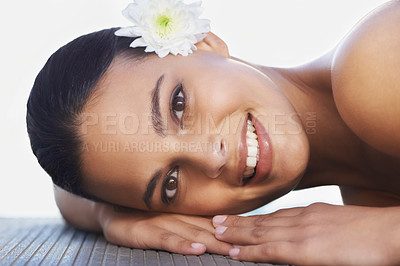 Buy stock photo Flower, relax or portrait of happy woman in resort for wellness, cosmetics or hospitality in hotel. Calm peace, smile or person in spa on break or holiday vacation for beauty, skincare or health