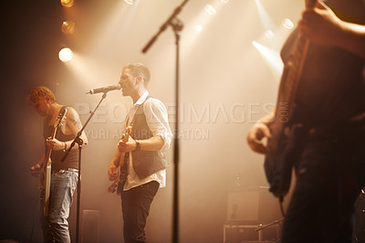 Buy stock photo Cropped shot of music performers on stage