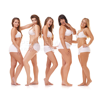 Buy stock photo A group of women with different body shapes standing together in their underwear while isolated on white