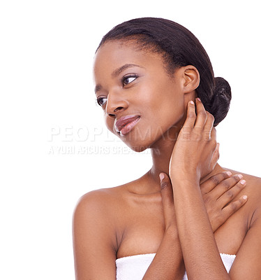 Buy stock photo Studio shot of a beautiful young woman touching her skin